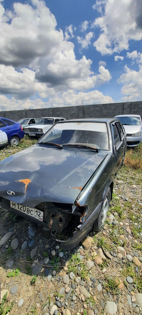 Автомобиль ВАЗ 211440 LADA SAMARA с государственным регистрационным знаком М 120 ВС 12, 2010 года выпуска, цвет: серо - сине - зеленый, идентификационный номер (VIN): XTA211440A4839807