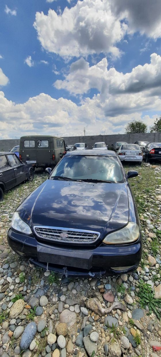 Автомобиль KIA CLARUS с государственным регистрационным знаком К 894 МС 01, 2000 года выпуска, цвет: черный, идентификационный номер (VIN): X4XGC2222Y0000247