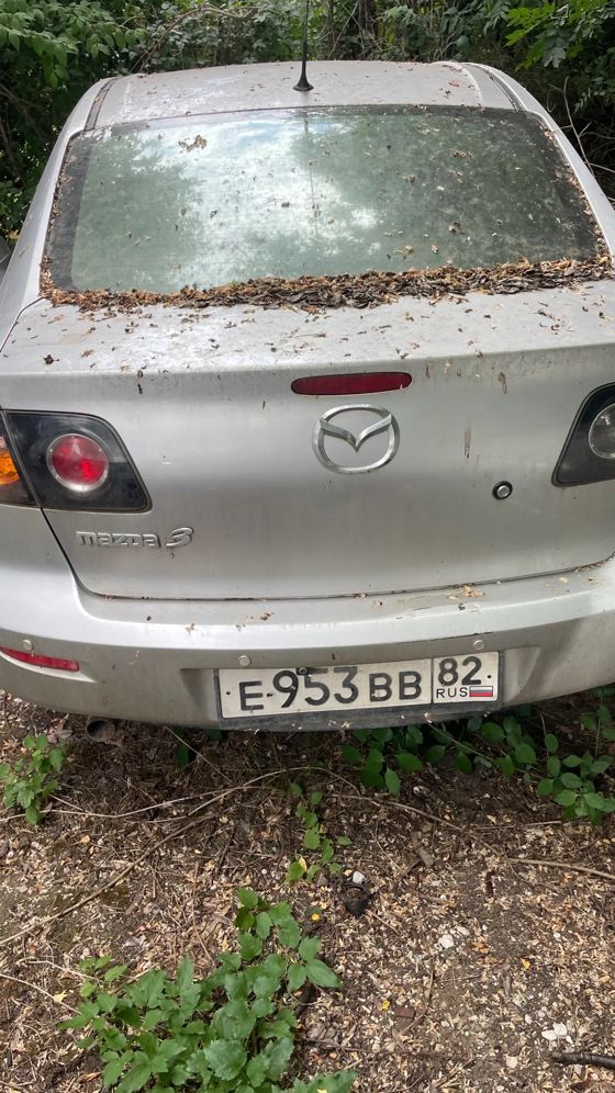 Автомобиль Мазда 3, год выпуска не установлен, г/н Е953ВВ82, серого цвета, VIN JMZBK12Z261307362.