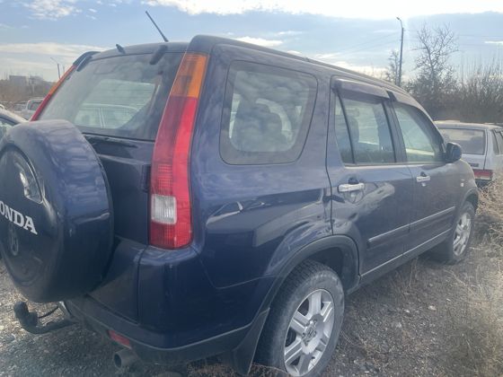 Транспортное средство марки «Honda C-RV», темно-синего цвета, 2004 г.в.,  с государственным регистрационным номером У542ВМ17. (ТС в залоге)