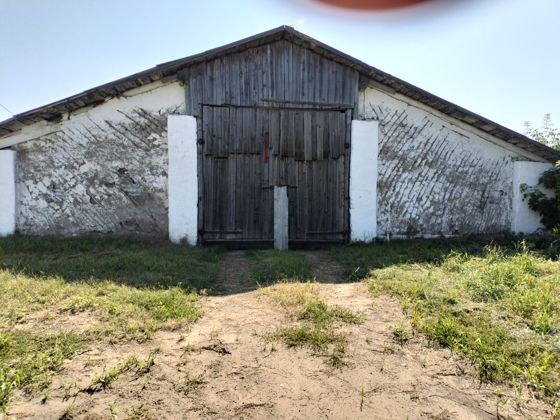 Нежилое здание 438 м² с участком, д. Авлы, Омская обл.