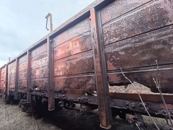 Полувагон 4-осный с люками в полу с тормозной площадкой